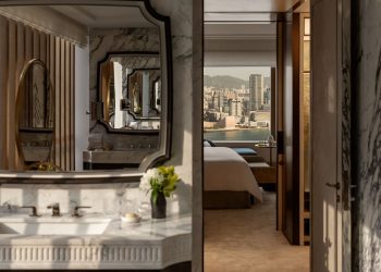 The Hong Kong Suite viewed from the bathroom and through the bedroom to the views of Victoria Harbour beyond